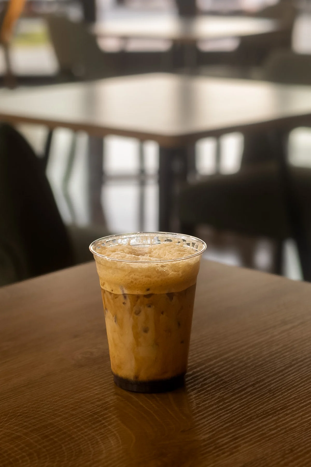 Iced coffee in an Elura café setting